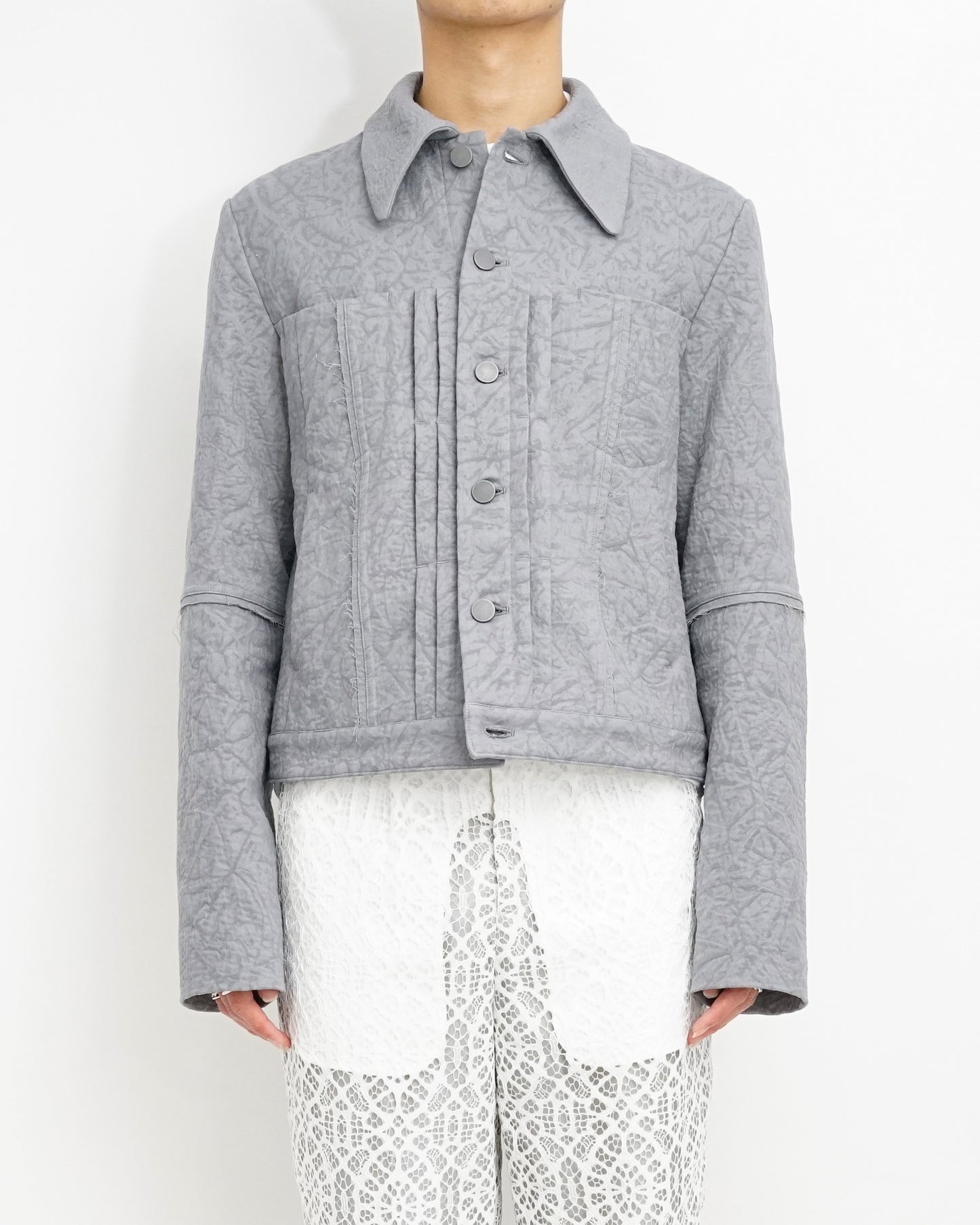 Shrink raw edge jacket