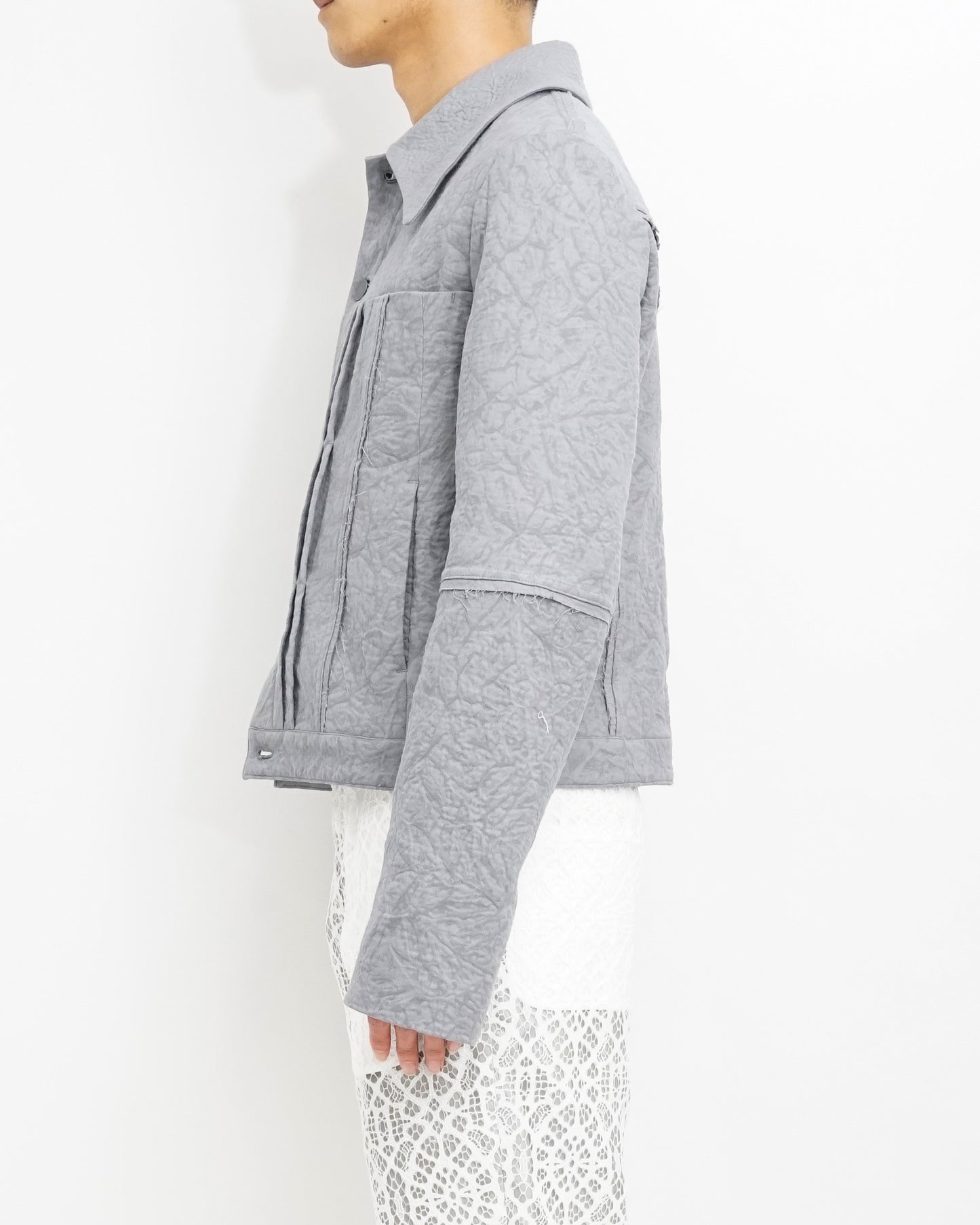 Shrink raw edge jacket